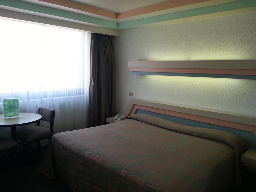 Hotel Puebla Mexiko-Stadt Zimmer foto